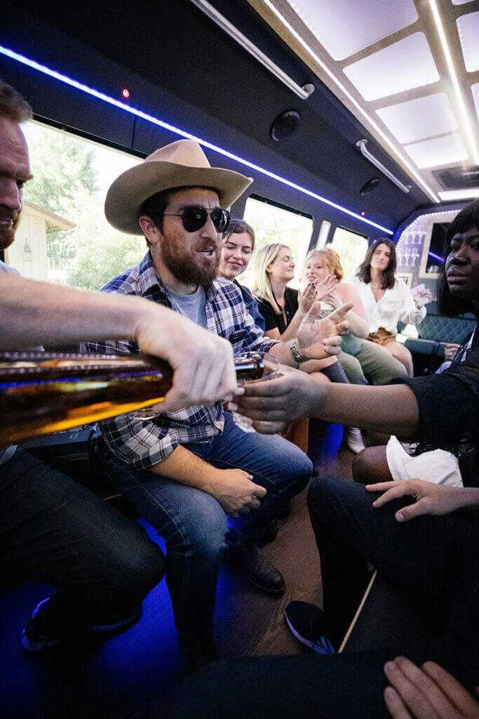 Birthday Party in Charleston SC in a party bus. Group of people drinking tequila